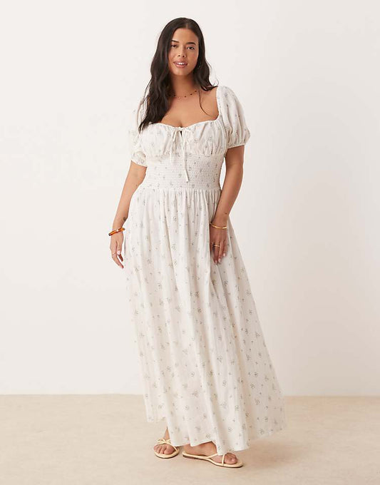 https://images.asos-media.com/products/esmee-curve-exclusive-puff-sleeve-tie-front-maxi-beach-dress-in-white-ditsy-floral/208556487-1-white?$n_750w$&wid=750&fit=constrain
