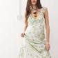 https://images.asos-media.com/products/reclaimed-vintage-maxi-cami-tea-dress-with-flutter-sleeves-in-green-floral-print/207813121-3?$n_750w$&wid=750&fit=constrain