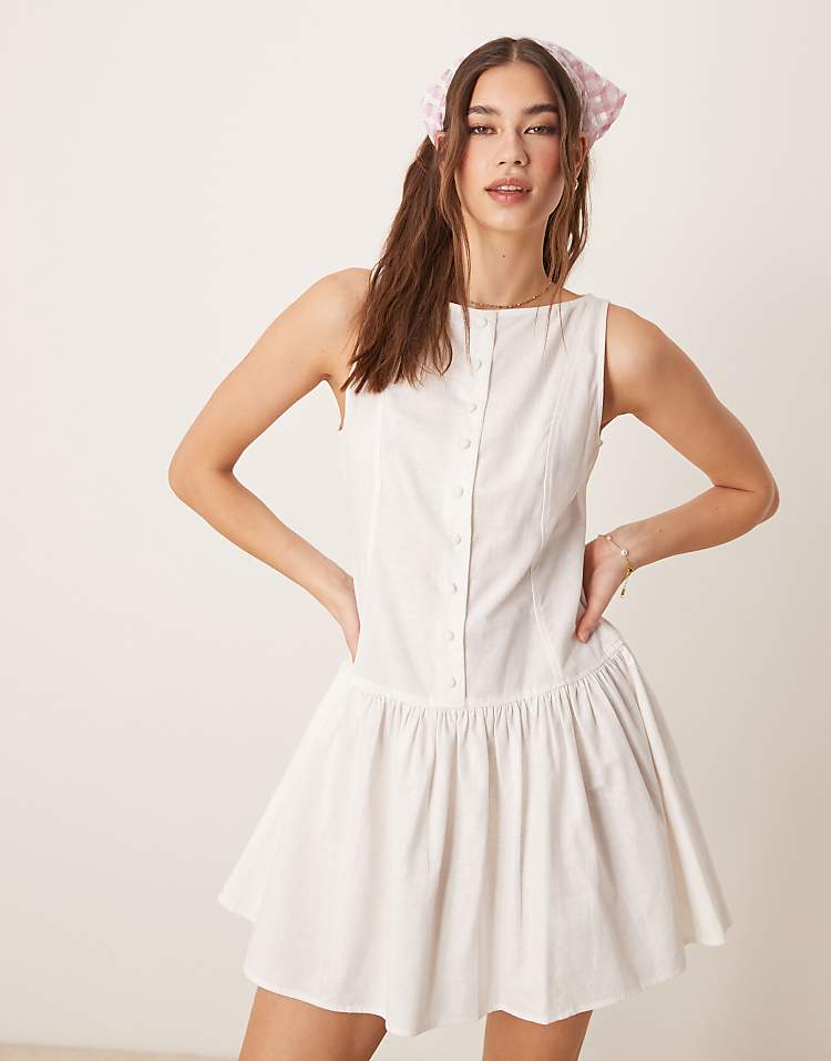 https://images.asos-media.com/products/asos-design-slash-neck-button-down-dropped-waist-mini-dress-in-white/207833550-1-white?$n_750w$&wid=750&fit=constrain