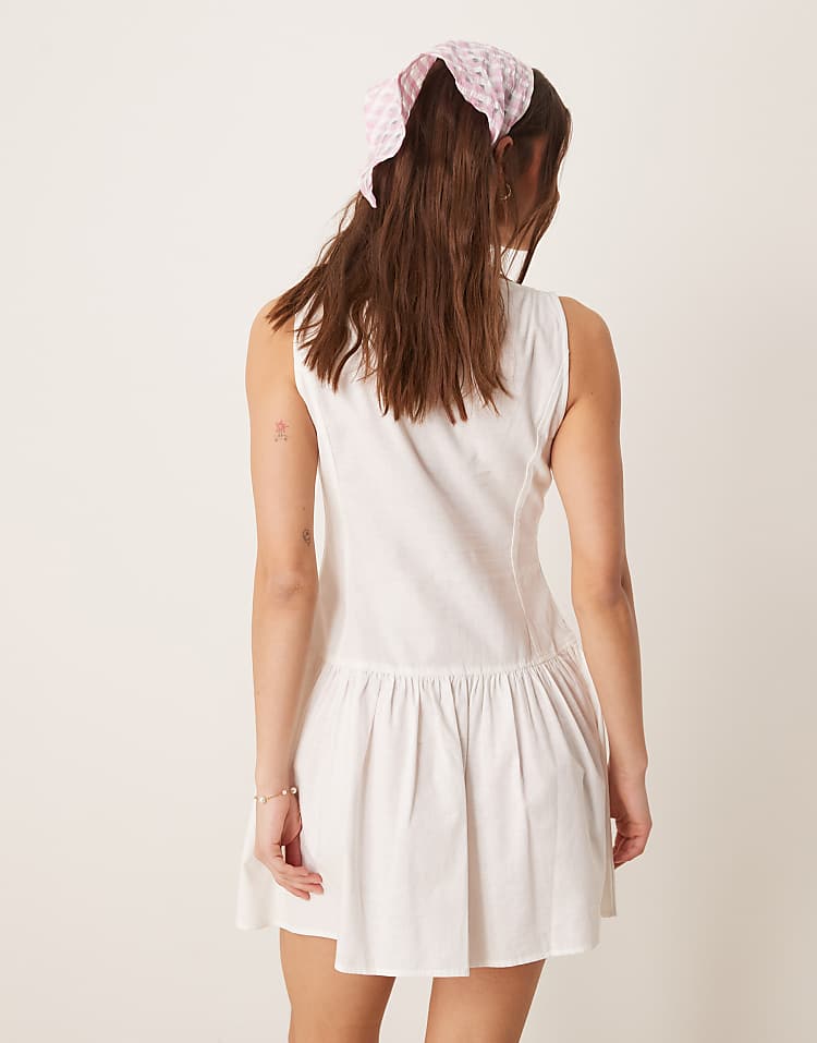 https://images.asos-media.com/products/asos-design-slash-neck-button-down-dropped-waist-mini-dress-in-white/207833550-3?$n_750w$&wid=750&fit=constrain