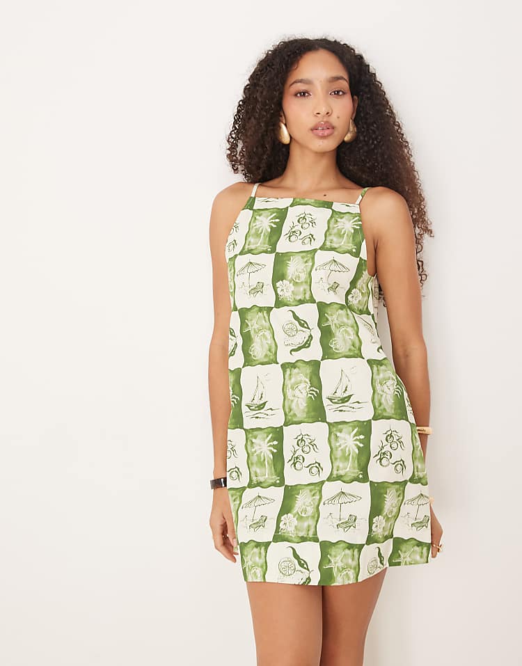 https://images.asos-media.com/products/asos-design-slash-neck-shapeless-mini-dress-in-postcard-print/207884312-1-postcardprint?$n_750w$&wid=750&fit=constrain