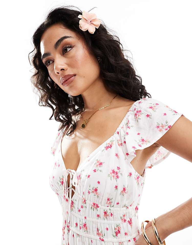 https://images.asos-media.com/products/hollister-short-sleeve-milkmaid-midi-slit-dress-in-pink-floral/207953366-4?$n_750w$&wid=750&fit=constrain