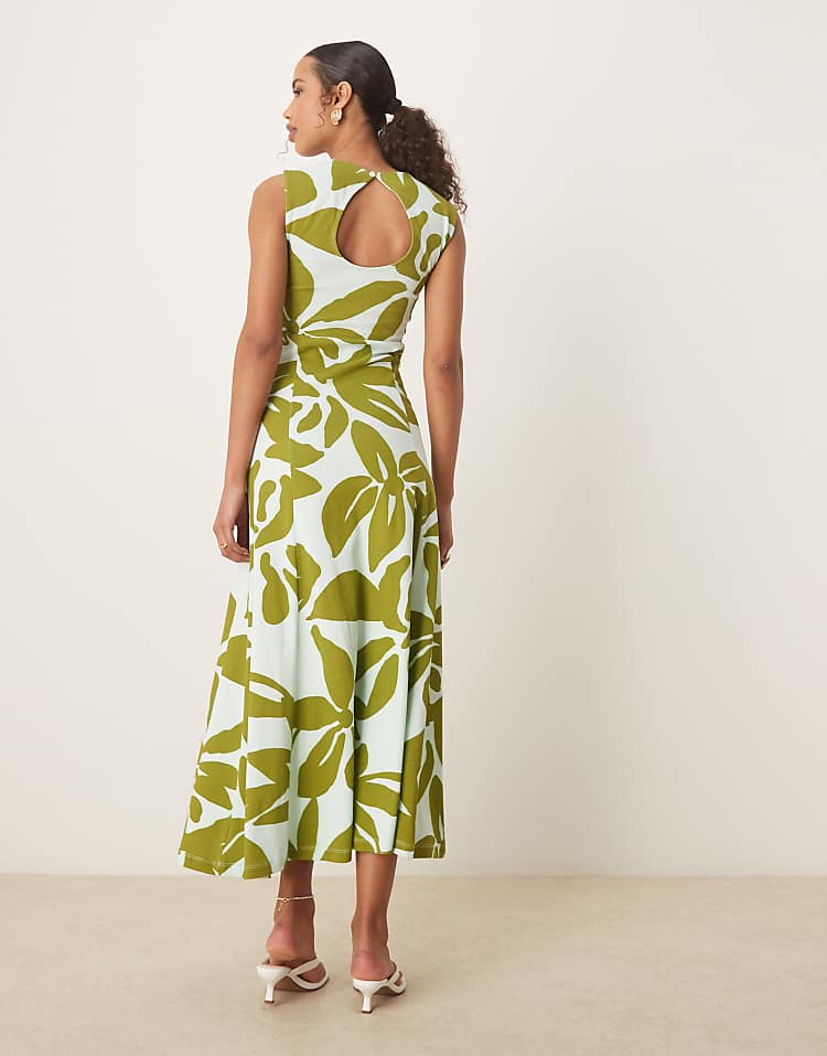 https://images.asos-media.com/products/asos-design-cotton-sleeveless-midi-sundress-in-green-oversized-floral-print/208033948-4?$n_750w$&wid=750&fit=constrain