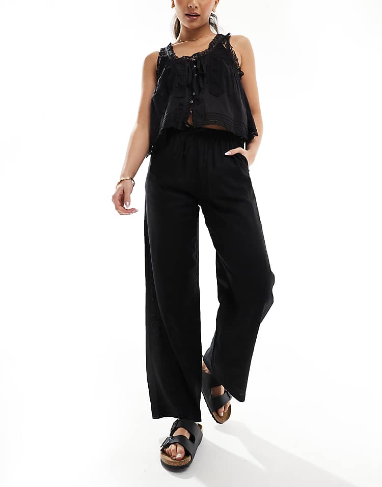 https://images.asos-media.com/products/bershka-tie-waist-wide-leg-linen-trousers-in-black/208146424-1-black?$n_750w$&wid=750&fit=constrain