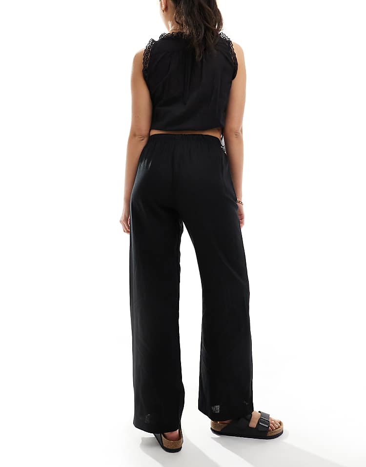 https://images.asos-media.com/products/bershka-tie-waist-wide-leg-linen-trousers-in-black/208146424-2?$n_750w$&wid=750&fit=constrain