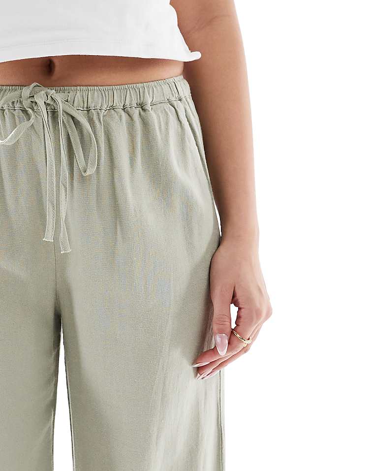 https://images.asos-media.com/products/pullbear-high-waisted-linen-look-trousers-in-sage-green/208150001-5?$n_750w$&wid=750&fit=constrain
