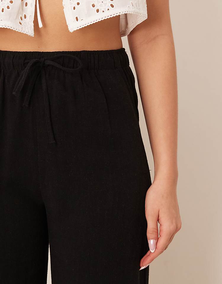 https://images.asos-media.com/products/stradivarius-linen-look-pull-on-trouser-in-black/208178935-5?$n_750w$&wid=750&fit=constrain