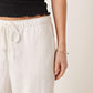 https://images.asos-media.com/products/stradivarius-linen-look-pull-on-trouser-in-white/208178944-4?$n_750w$&wid=750&fit=constrain