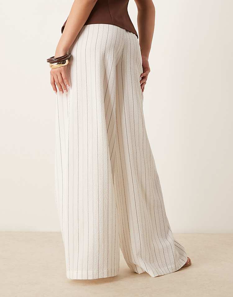 https://images.asos-media.com/products/stradivarius-linen-look-wide-leg-trouser-in-ecru-stripe/208268260-3?$n_750w$&wid=750&fit=constrain