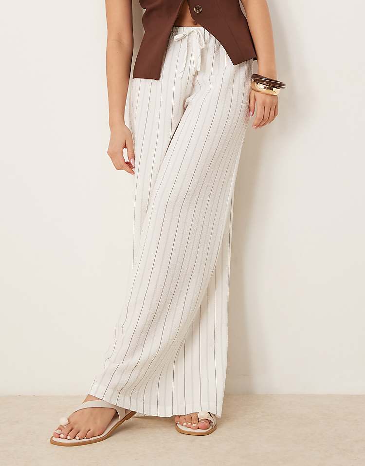 https://images.asos-media.com/products/stradivarius-linen-look-wide-leg-trouser-in-ecru-stripe/208268260-5?$n_750w$&wid=750&fit=constrain