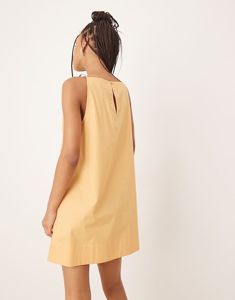 https://images.asos-media.com/products/asos-design-slash-neck-shapeless-mini-in-golden-sand/208283225-3?$n_750w$&wid=750&fit=constrain