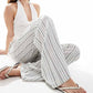 https://images.asos-media.com/products/stradivarius-linen-look-pull-on-crinkle-trouser-in-stripe/208312403-5?$n_750w$&wid=750&fit=constrain