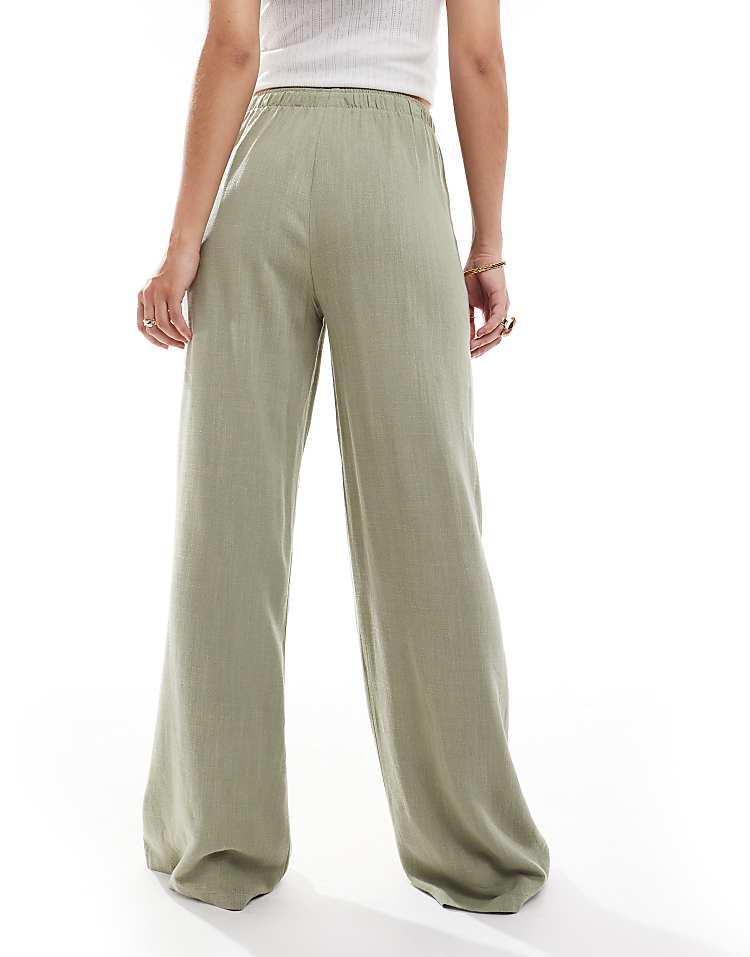 https://images.asos-media.com/products/stradivarius-linen-look-pull-on-trouser-in-khaki/208361860-5?$n_750w$&wid=750&fit=constrain