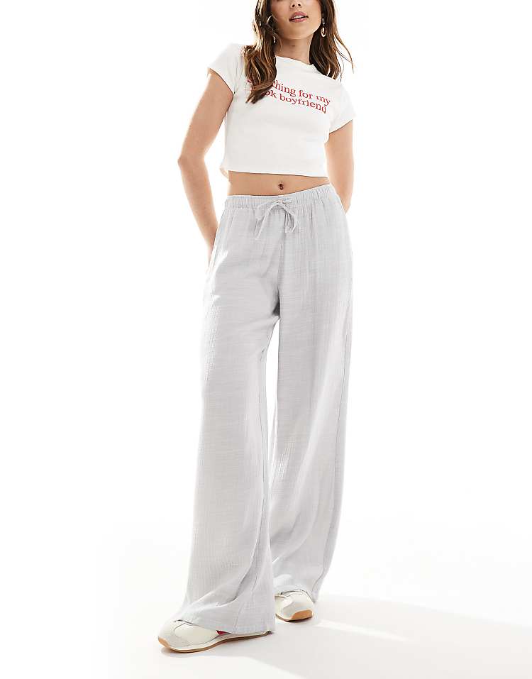 https://images.asos-media.com/products/stradivarius-linen-look-pull-on-crinkle-trouser-in-light-grey/208362063-1-grey?$n_750w$&wid=750&fit=constrain
