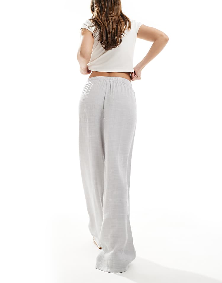 https://images.asos-media.com/products/stradivarius-linen-look-pull-on-crinkle-trouser-in-light-grey/208362063-3?$n_750w$&wid=750&fit=constrain