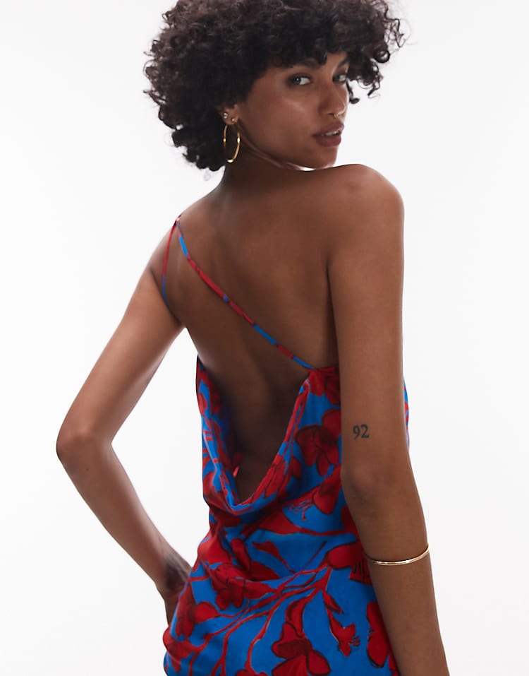 https://images.asos-media.com/products/topshop-asymmetric-one-shoulder-open-back-midi-occasion-dress-in-bold-red-and-blue-floral/208404024-3?$n_750w$&wid=750&fit=constrain