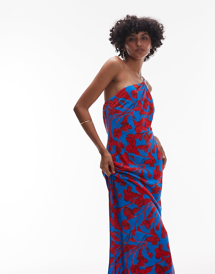 https://images.asos-media.com/products/topshop-asymmetric-one-shoulder-open-back-midi-occasion-dress-in-bold-red-and-blue-floral/208404024-4?$n_750w$&wid=750&fit=constrain