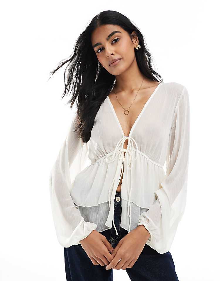 https://images.asos-media.com/products/pullbear-ruffle-detail-blouse-in-white/208540765-1-white?$n_750w$&wid=750&fit=constrain