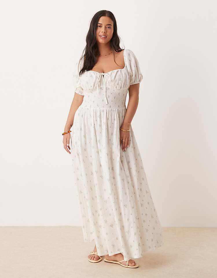 https://images.asos-media.com/products/esmee-curve-exclusive-puff-sleeve-tie-front-maxi-beach-dress-in-white-ditsy-floral/208556487-1-white?$n_750w$&wid=750&fit=constrain