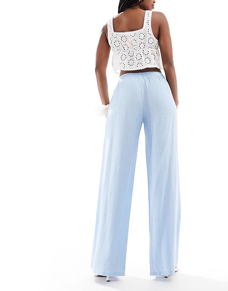 https://images.asos-media.com/products/stradivarius-linen-look-pull-on-crinkle-trouser-in-blue/208635333-2?$n_750w$&wid=750&fit=constrain