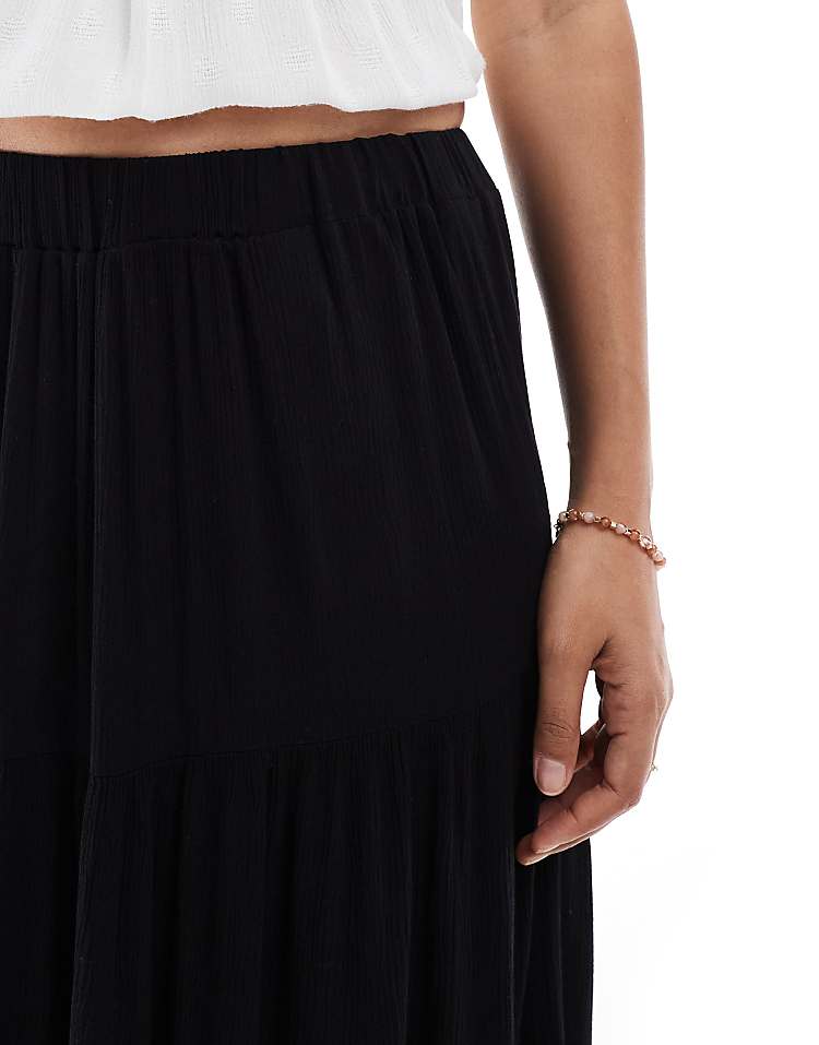 https://images.asos-media.com/products/stradivarius-petite-boho-midi-skirt-in-black/208677459-5?$n_750w$&wid=750&fit=constrain