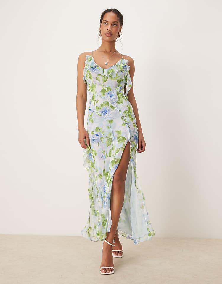 https://images.asos-media.com/products/mango-v-neck-ruffle-botanical-printed-dress-with-side-split-in-pale-blue/208733360-1-blue?$n_750w$&wid=750&fit=constrain