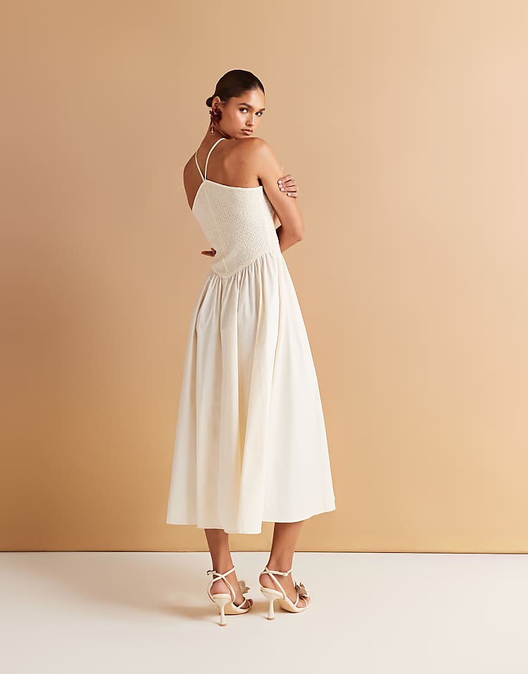 https://images.asos-media.com/products/mango-woven-halter-neck-bodice-dress-with-volume-a-line-skirt-in-ecru/208735157-2?$n_750w$&wid=750&fit=constrain