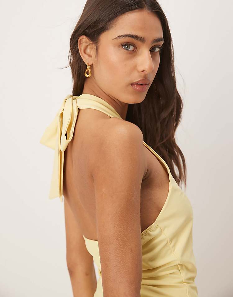 https://images.asos-media.com/products/asos-design-halter-mini-rara-skirt-in-yellow/208751805-3?$n_750w$&wid=750&fit=constrain